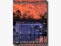 CUSTOM BUILT HOUSEBOAT ON ALUMINUM BARGE